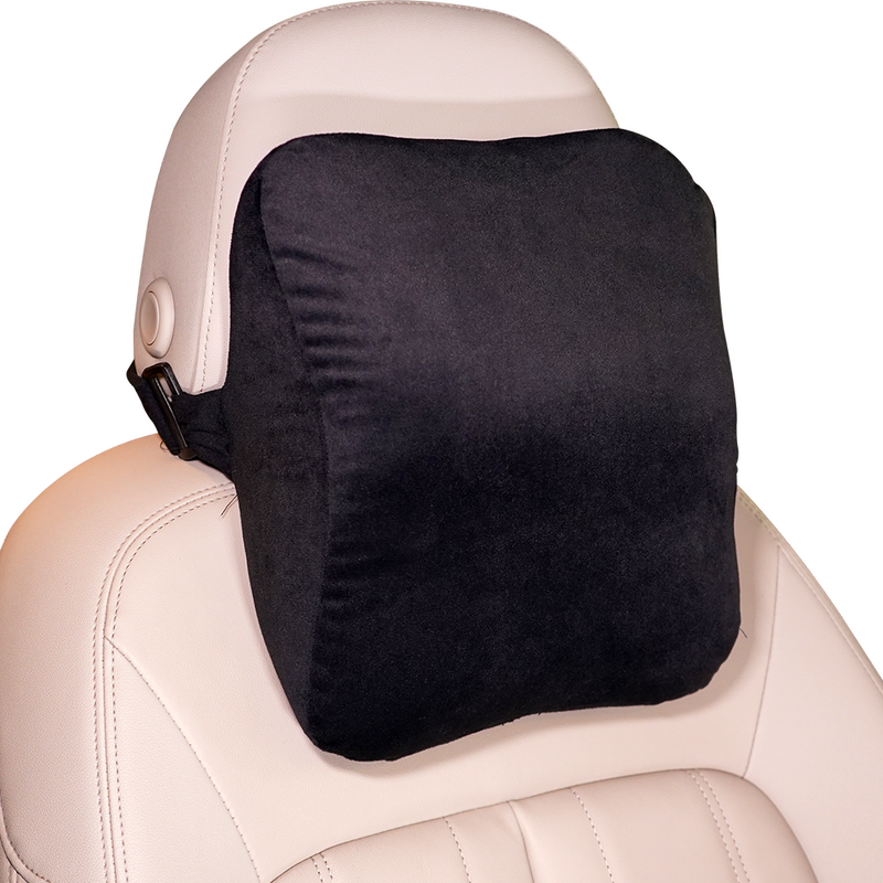 Black neck rest pillow on a beige car seat
