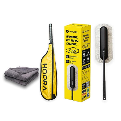 Hoora car duster on a white background, including a yellow and black carrying sleeve, a boxed package, a black-handled brush with white bristles, and folded gray microfiber cloth.